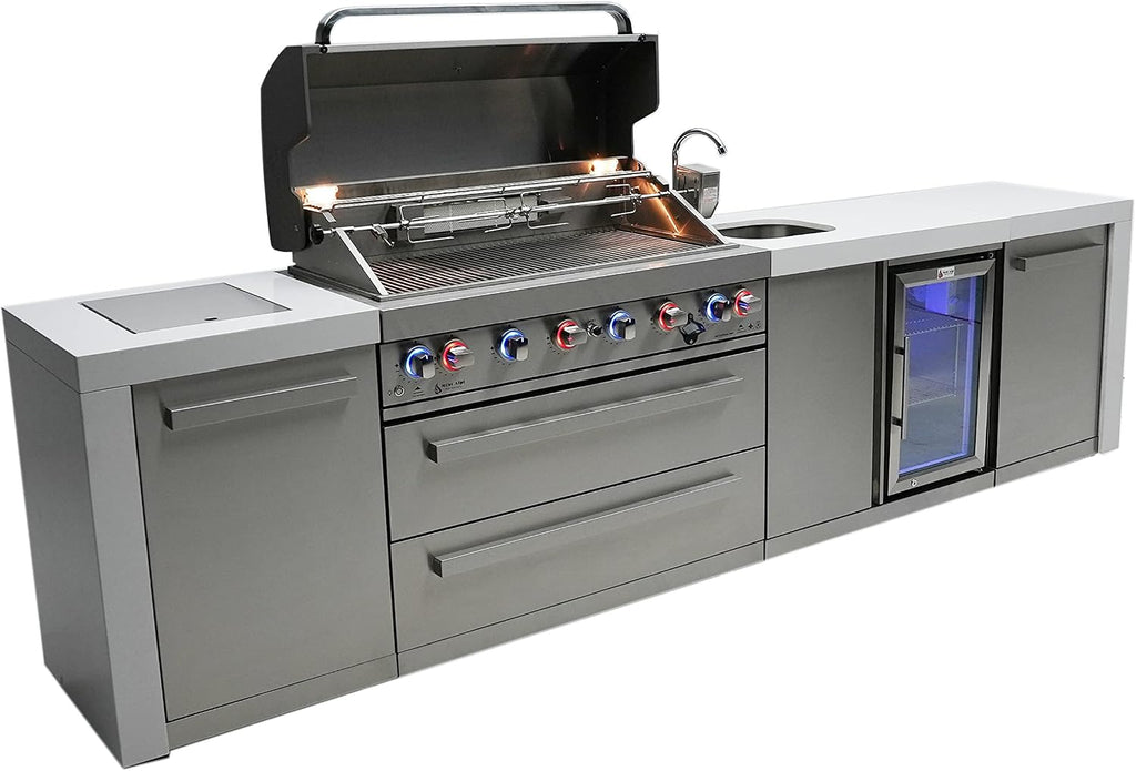 Mont Alpi 132'W x 23'D x 46'H Deluxe Stainless Steel Outdoor Kitchen Island with Refrigerator Faucet & Sink Combo + 44'W 6-Burner BBQ Grill + Granite Countertops + Storage Cabinets + Drawers + Cover