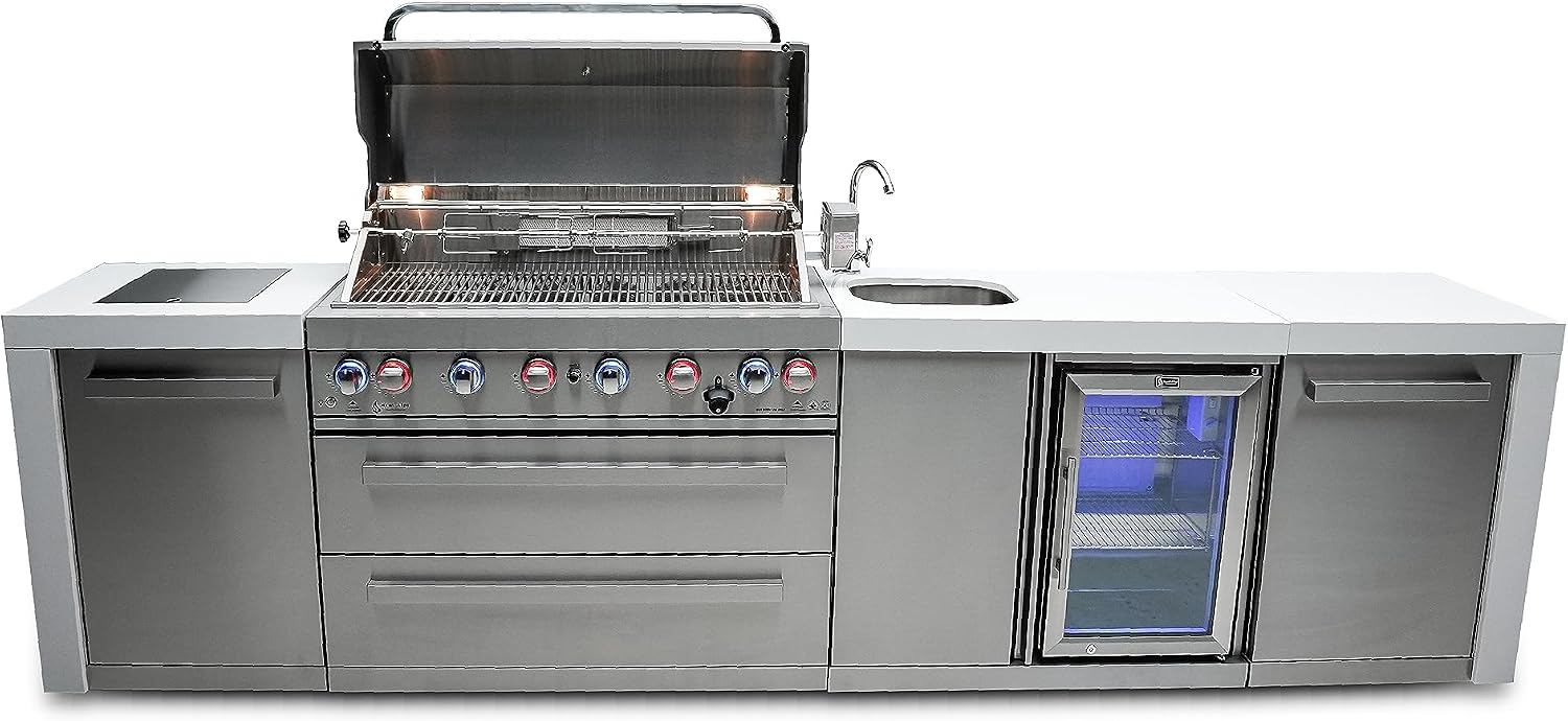 Mont Alpi 132'W x 23'D x 46'H Deluxe Stainless Steel Outdoor Kitchen Island with Refrigerator Faucet & Sink Combo + 44'W 6-Burner BBQ Grill + Granite Countertops + Storage Cabinets + Drawers + Cover