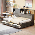 Wooden Daybed with 3 Storage Drawers, Upper Soft Board, Shelf, and a Set of Sockets and USB Ports, Twin Size, Gray